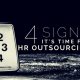 A dark room with a clock and title - 4 signs it's time for HR outsourcing
