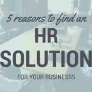 Five guys sitting around a conference table smiling at each other. Title - 5 reasons to find an HR SOLUTION for your businesss